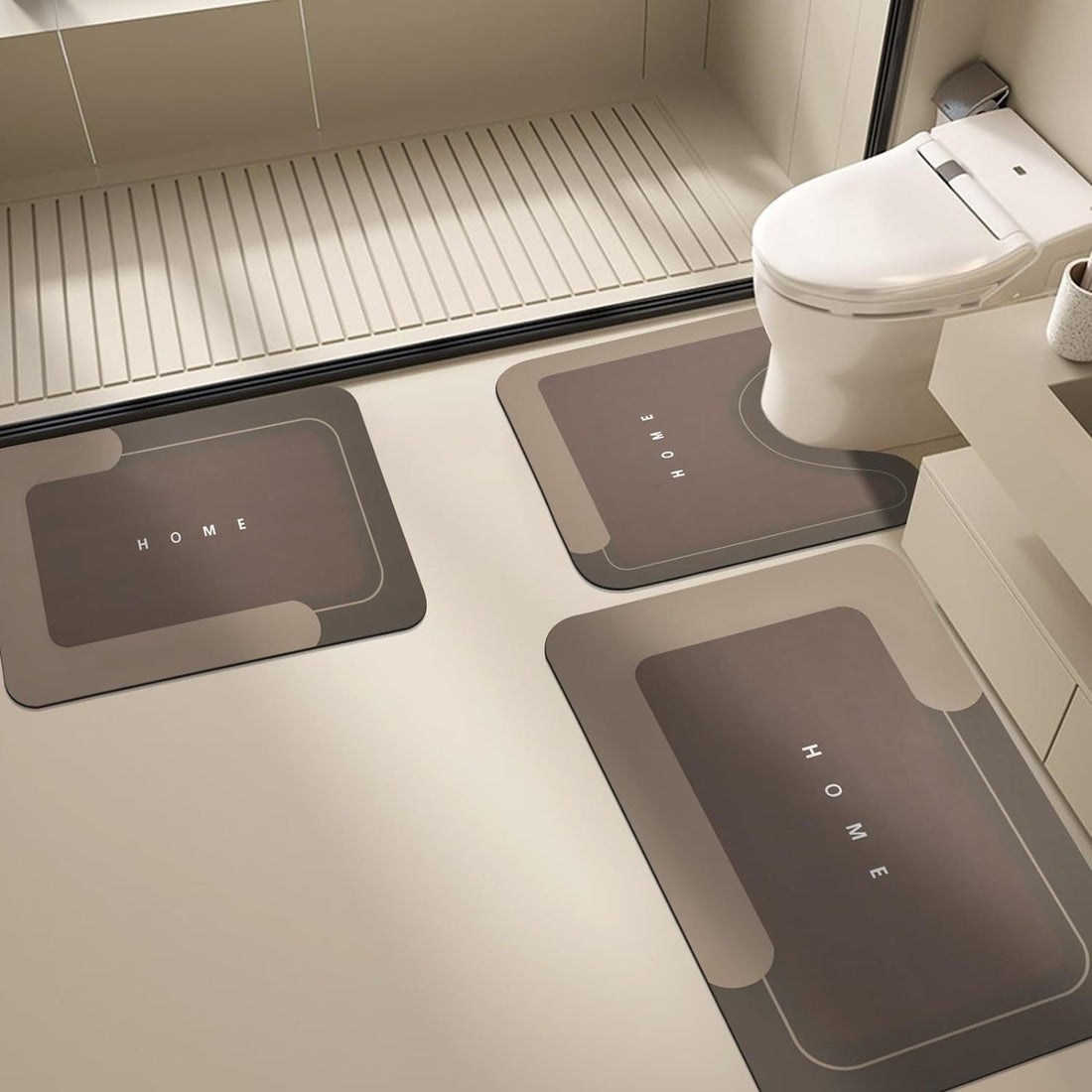 Brown Mattona 3-piece bath mat set in a bathroom
