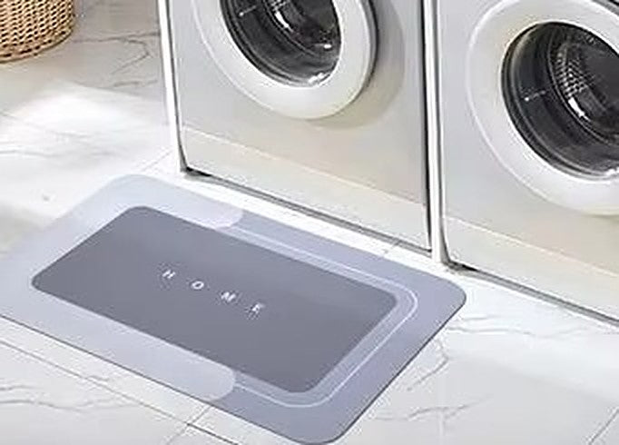 Mattona bath mat in front of washing machines