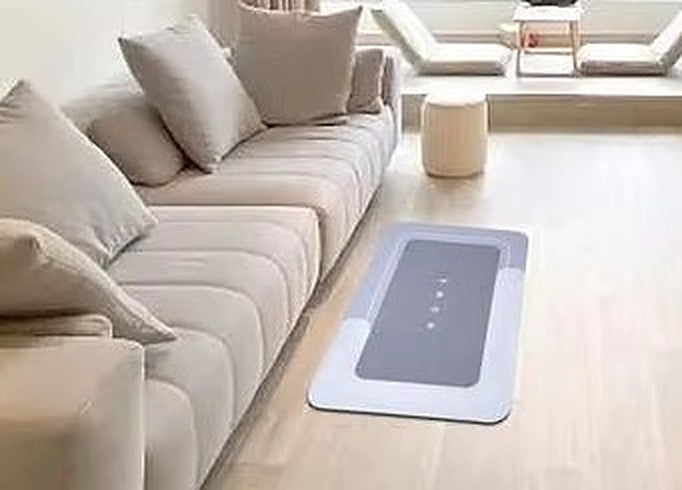 Mattona mat beside a sofa in a living room