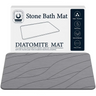 Quick-dry diatomaceous earth stone bath mat with non-slip base