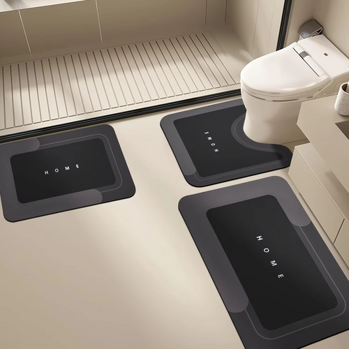 Black Mattona 3-piece bath mat set in a bathroom