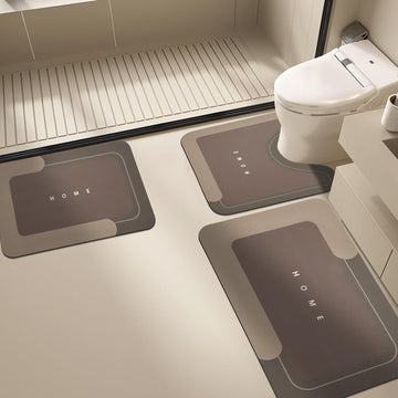 Brown Mattona 3-piece bathroom mat set with U-shaped toilet mat in a modern bathroom