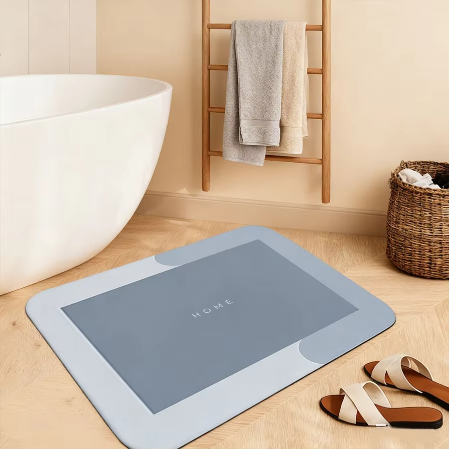 Super absorbent diatomaceous earth bath mat with a fast-drying surface and non-slip base